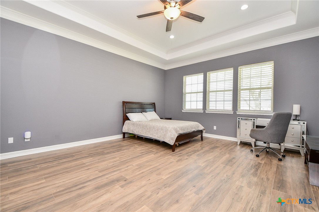 1093 Sunderman Road Alleyton, TX 78935 - Photo 36 of 48 a bedroom with a bed and a desk