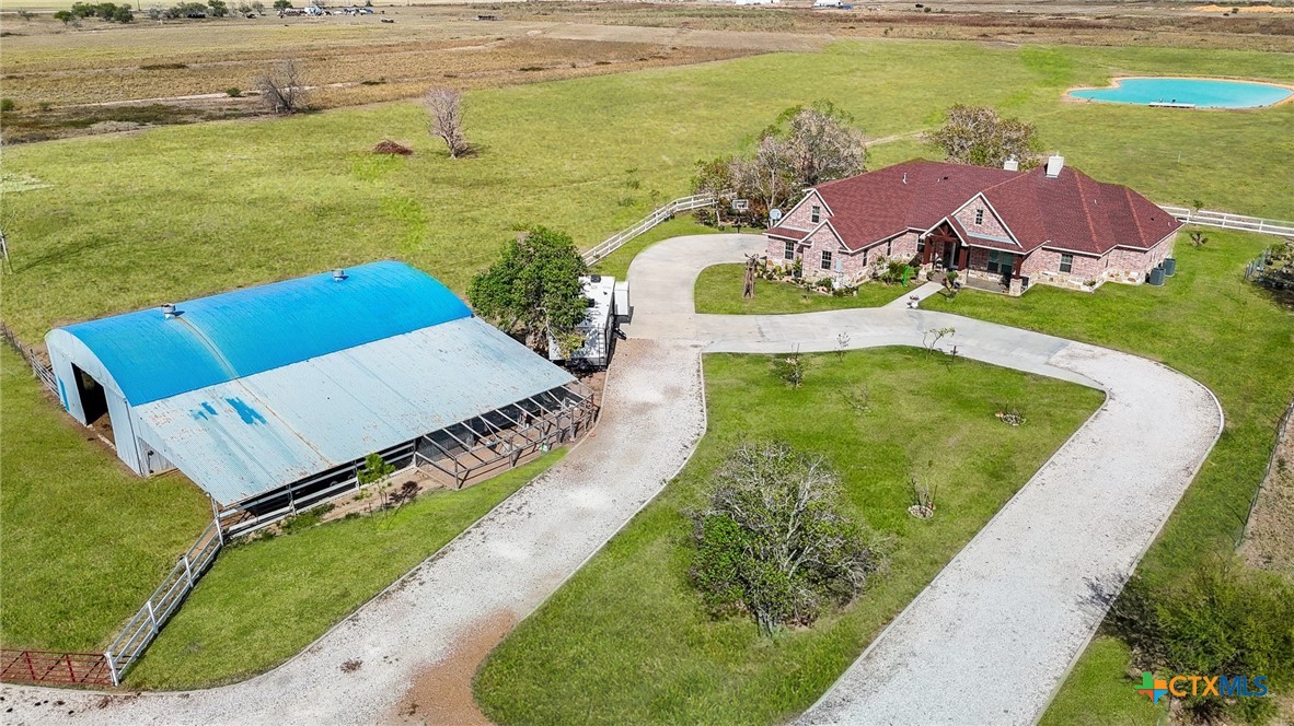 1093 Sunderman Road Alleyton, TX 78935 - Photo 4 of 48 an aerial view of a house with a ocean view