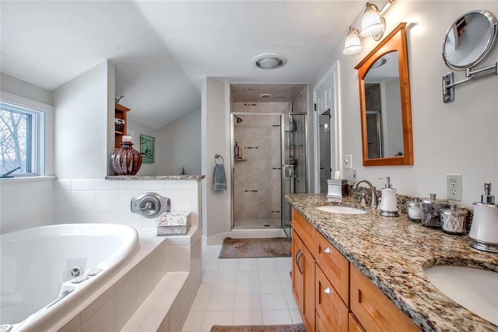 149 Backbone Road Sewickley, PA 15143 - Photo 15 of 25 Master Bath with Jetted Tub and Double Bowl Vanity with a Granite Top.