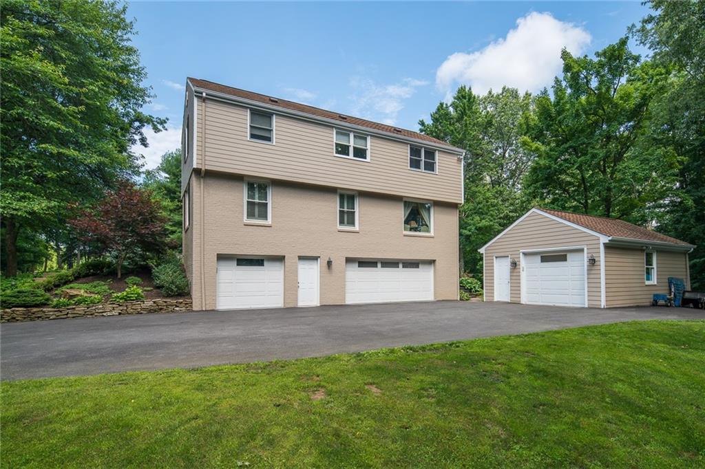 149 Backbone Road Sewickley, PA 15143 - Photo 24 of 25 Don't Miss the 3-Car Integral Garage and 1-Car Detached Garage Space. Room Aside the Garage for a Boat or Camper if Desired