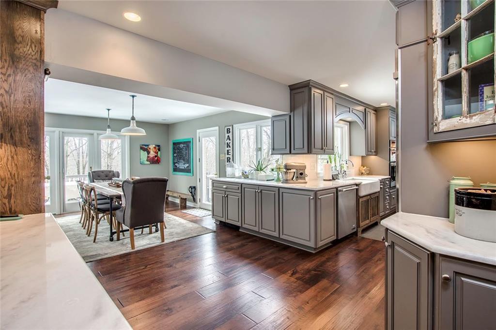 149 Backbone Road Sewickley, PA 15143 - Photo 6 of 25 Newly Renovated Kitchen with Grey Cabinetry, Hardwood Flooring and Open to Both the Breakfast Area and Dining Rooms