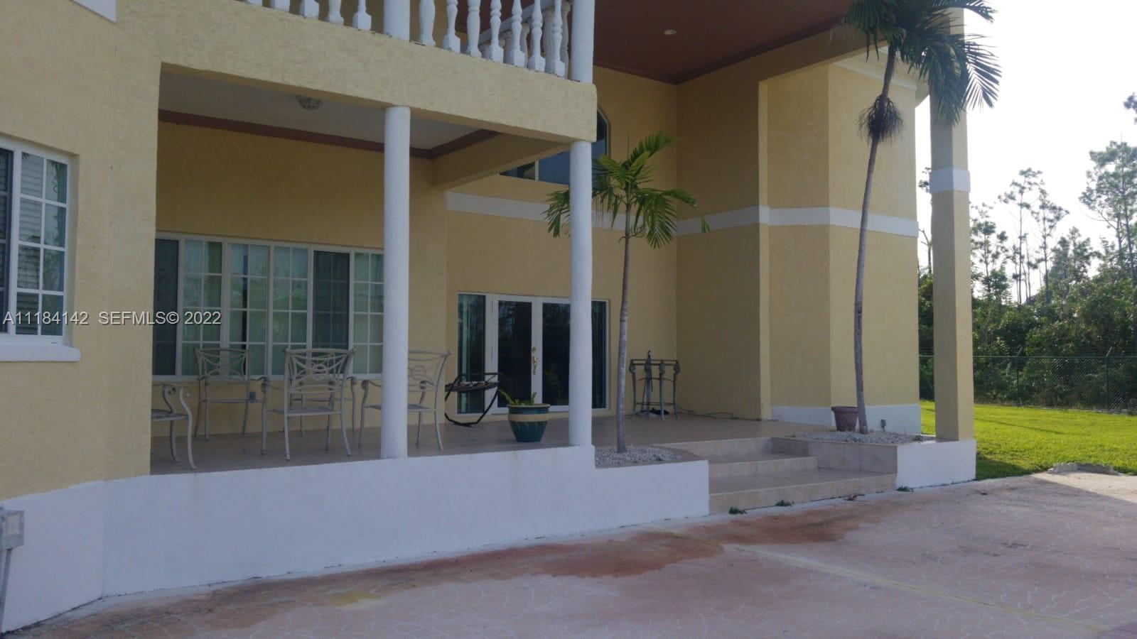 6 Bahama undefined, BA 00000 - Photo 2 of 15 a view of backyard with cabin