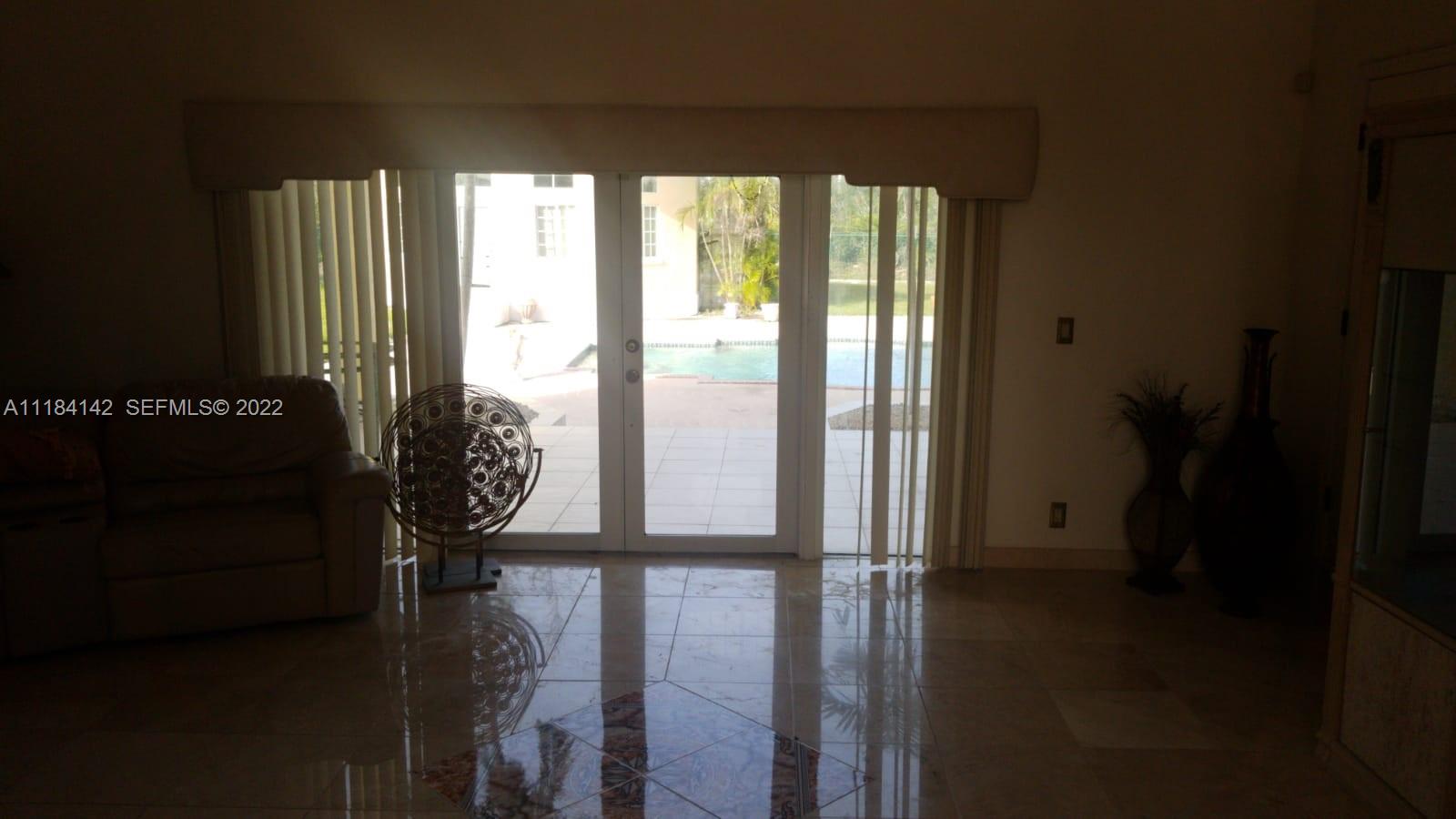 6 Bahama undefined, BA 00000 - Photo 8 of 15 a view of outdoor space with wooden floor