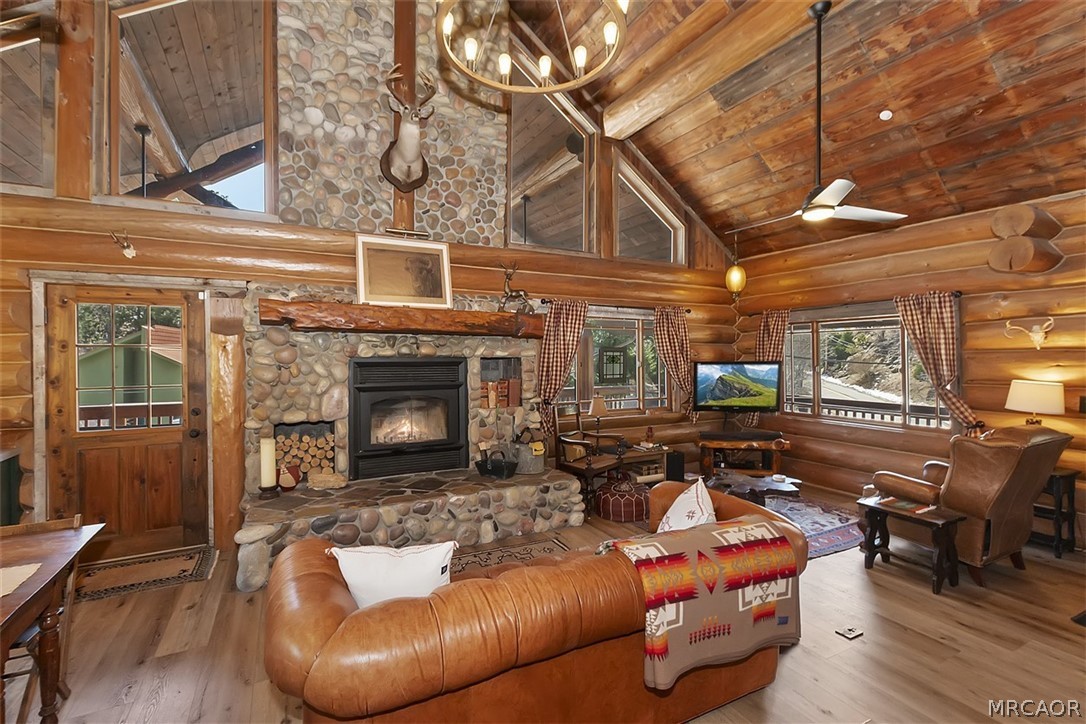 29632 Hook Creek Road Cedar Glen, CA 92321 - Photo 6 of 43 a living room with furniture and a fireplace