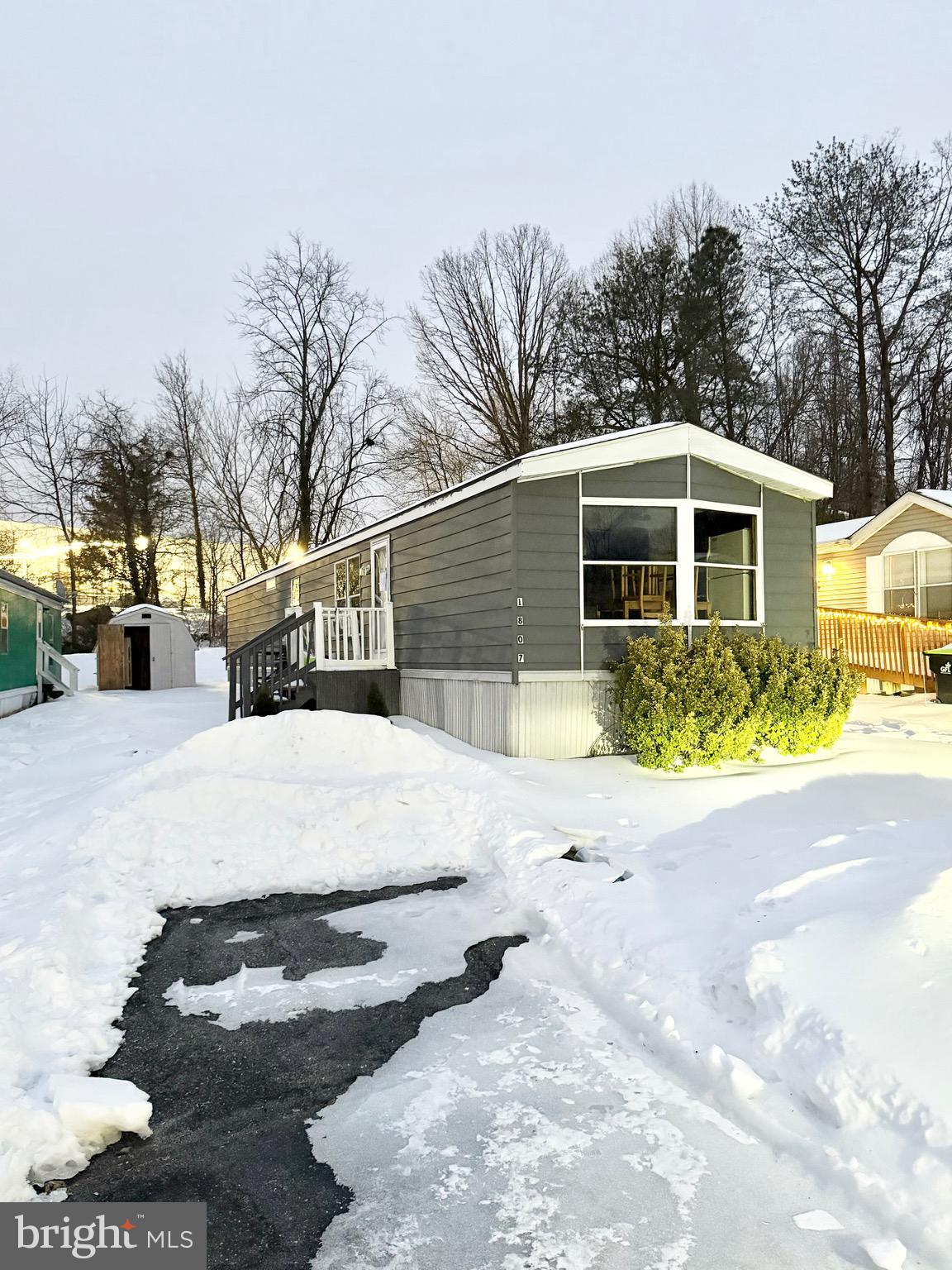 1807 Sandee Court Edgewood, MD 21040 - Photo 1 of 20 a view of a white house with a yard covered in snow