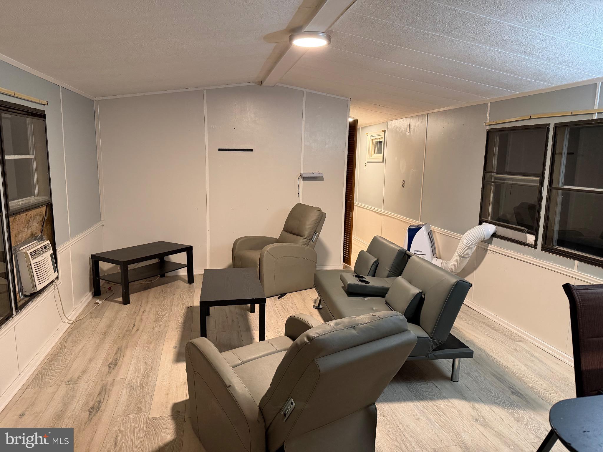 1807 Sandee Court Edgewood, MD 21040 - Photo 15 of 20 a living room with furniture and a flat screen tv