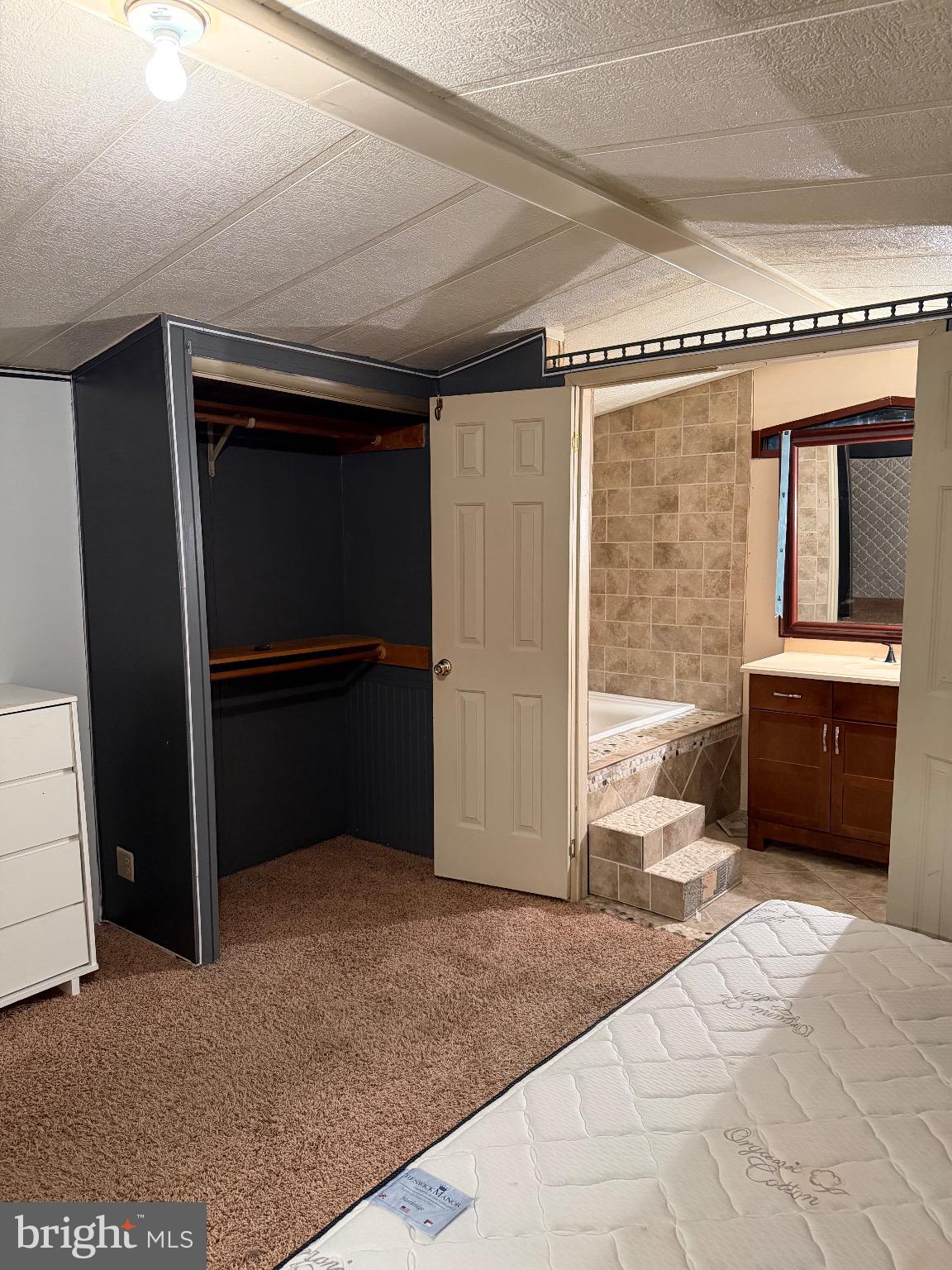 1807 Sandee Court Edgewood, MD 21040 - Photo 2 of 20 a bedroom with a bed and a dresser