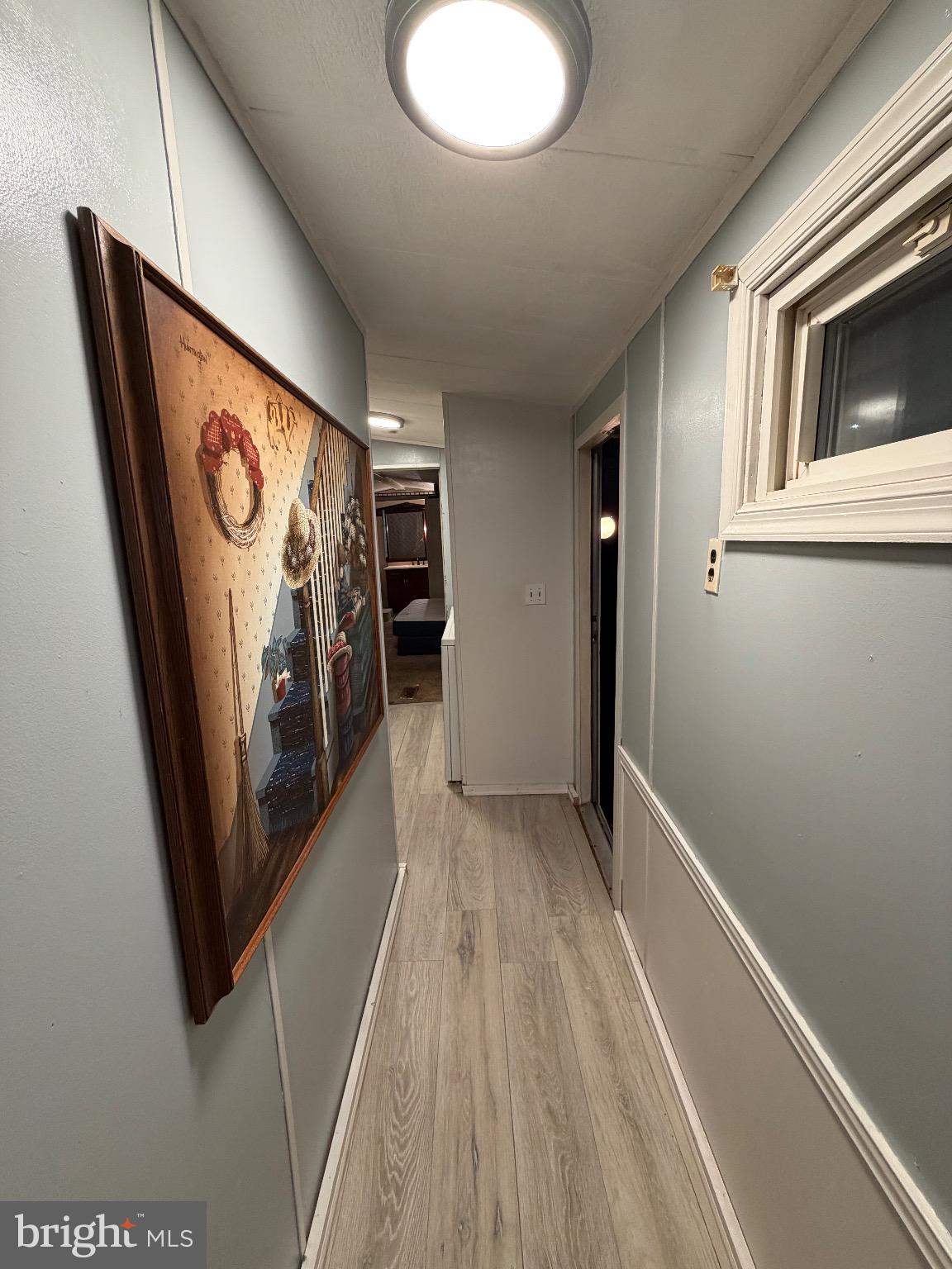 1807 Sandee Court Edgewood, MD 21040 - Photo 5 of 19 Inviting hallway with artistic charm.