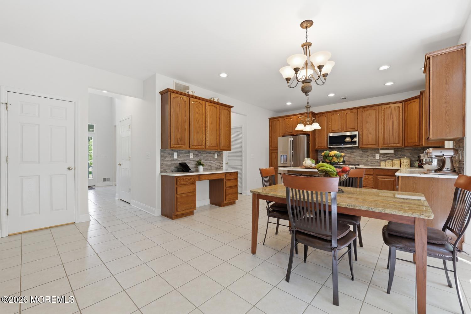 7 Cherry Tree Lane Cream Ridge, NJ 08514 - Photo 12 of 47 a view of kitchen with refrigerator and window