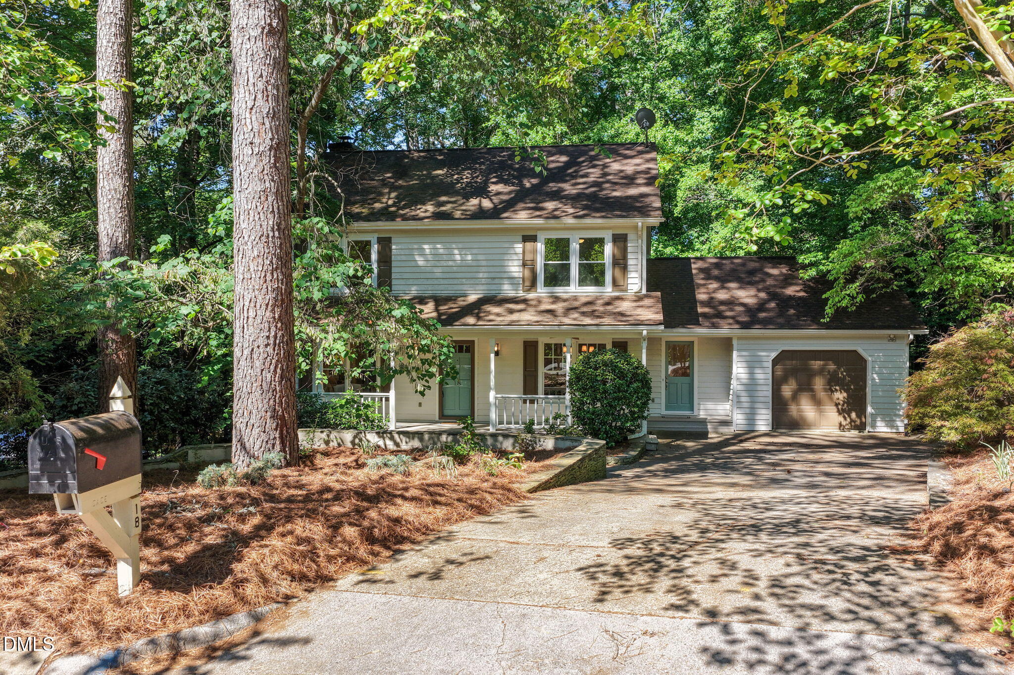 18 Strawberry Ridge Lane Durham, NC 27713 - Photo 53 of 59 a view of a house with backyard and sitting area