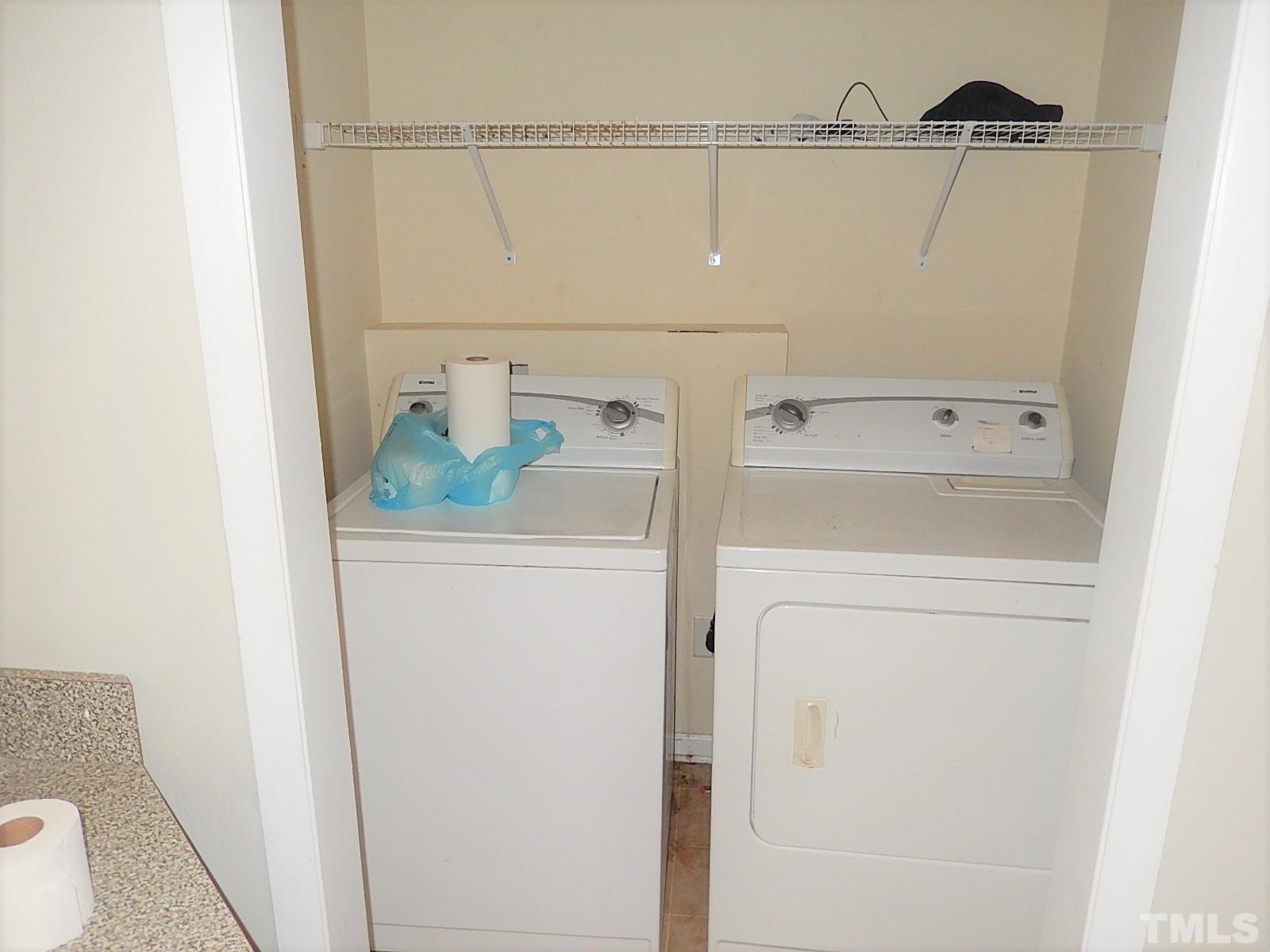 1015 Oberlin Road Raleigh, NC 27607 - Photo 11 of 26 a utility room with dryer and washer