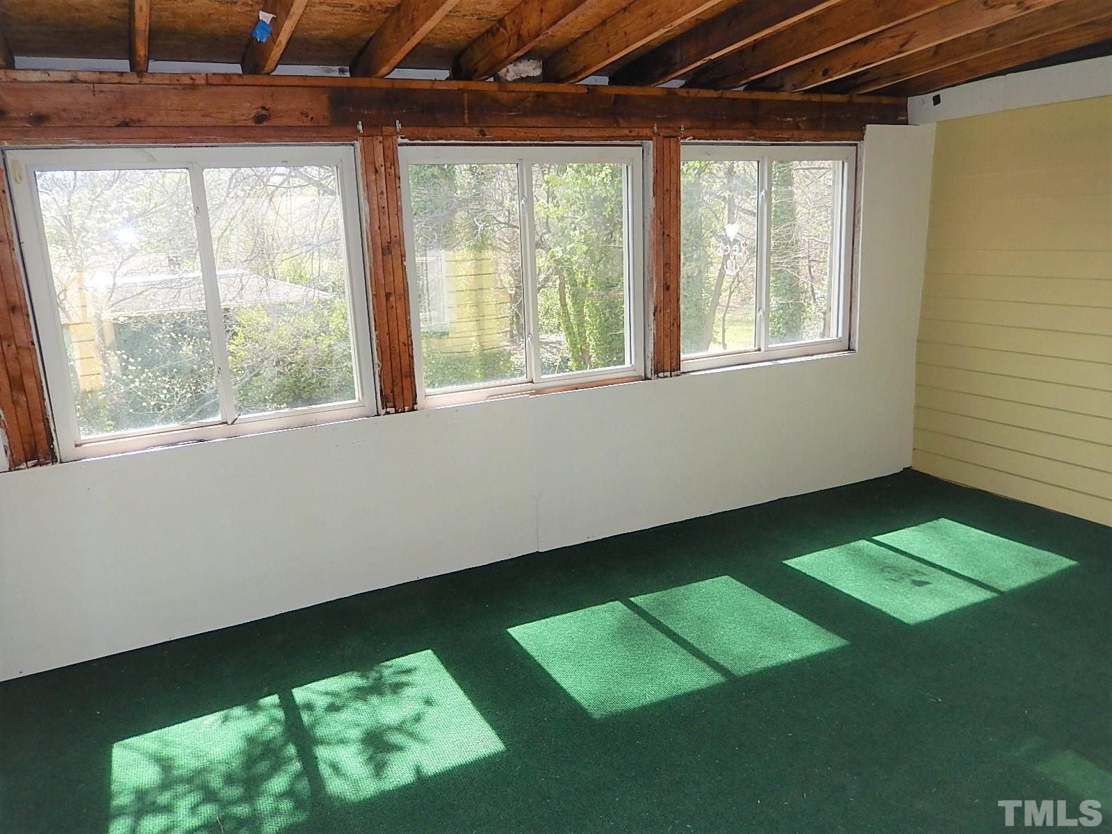 1015 Oberlin Road Raleigh, NC 27607 - Photo 19 of 26 a view of an empty room with a window