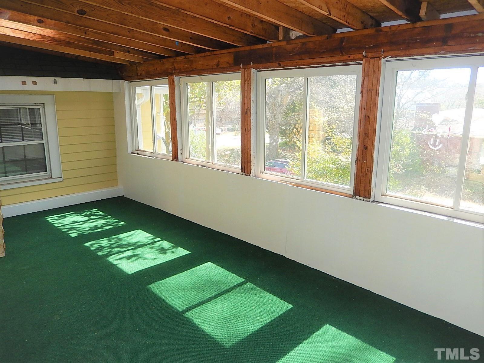1015 Oberlin Road Raleigh, NC 27607 - Photo 20 of 26 a view of an empty room with a window