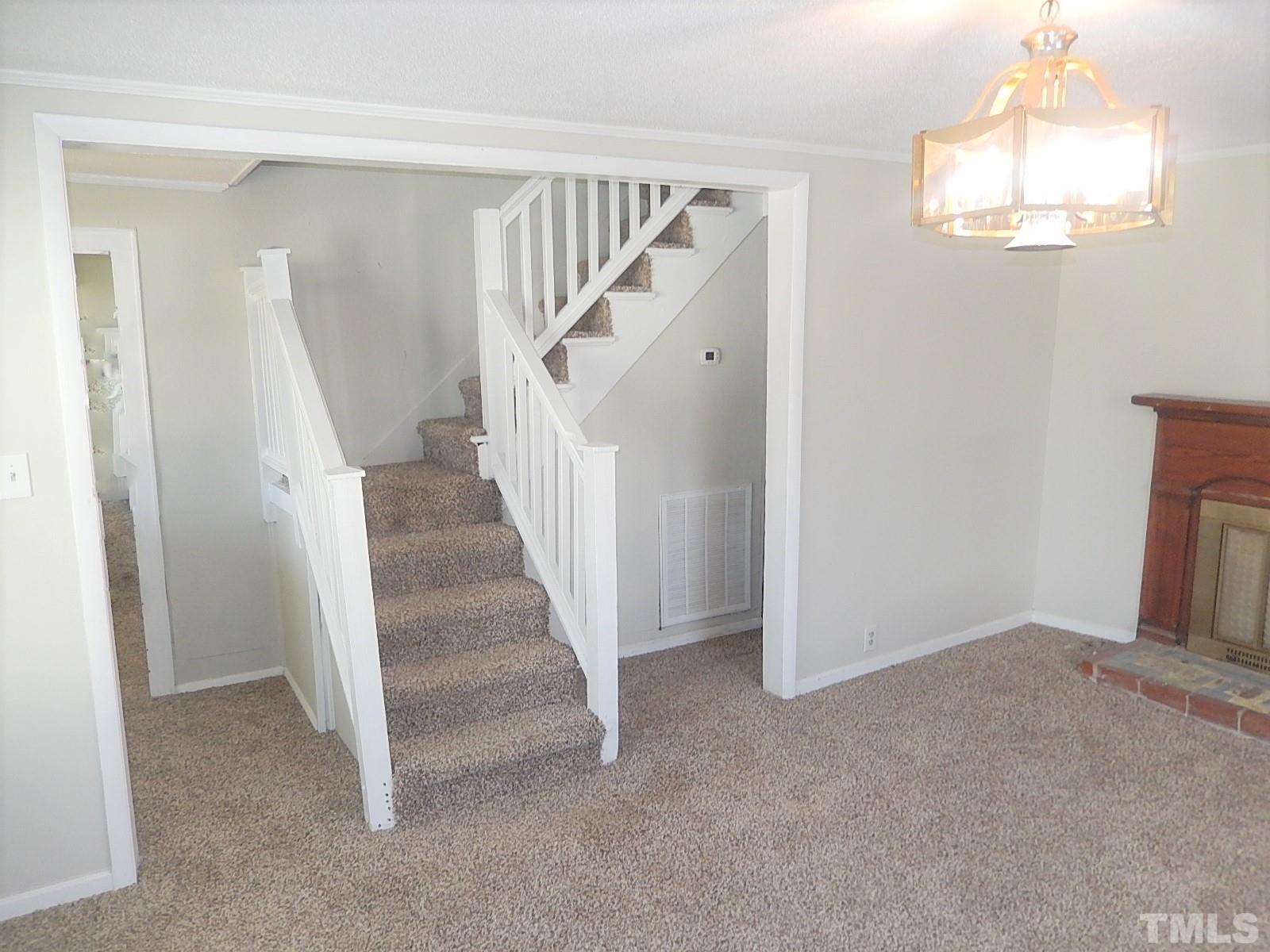 1015 Oberlin Road Raleigh, NC 27607 - Photo 3 of 26 a view of a hallway with windows and entryway
