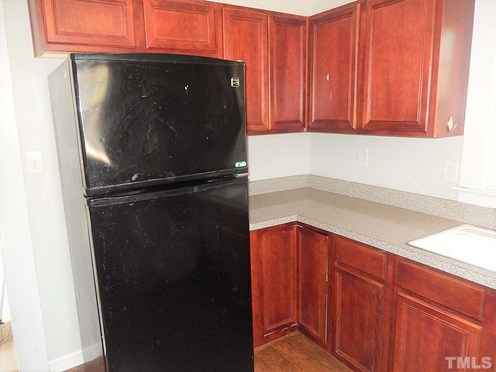 1015 Oberlin Road Raleigh, NC 27607 - Photo 7 of 26 a close view of a refrigerator in kitchen