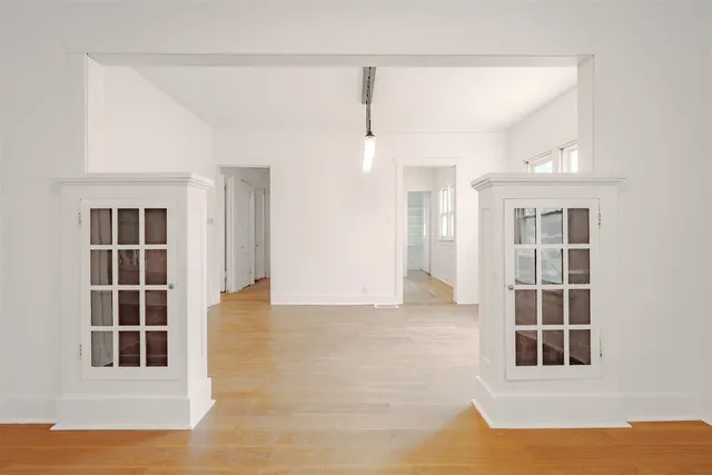 a view of empty room with windows