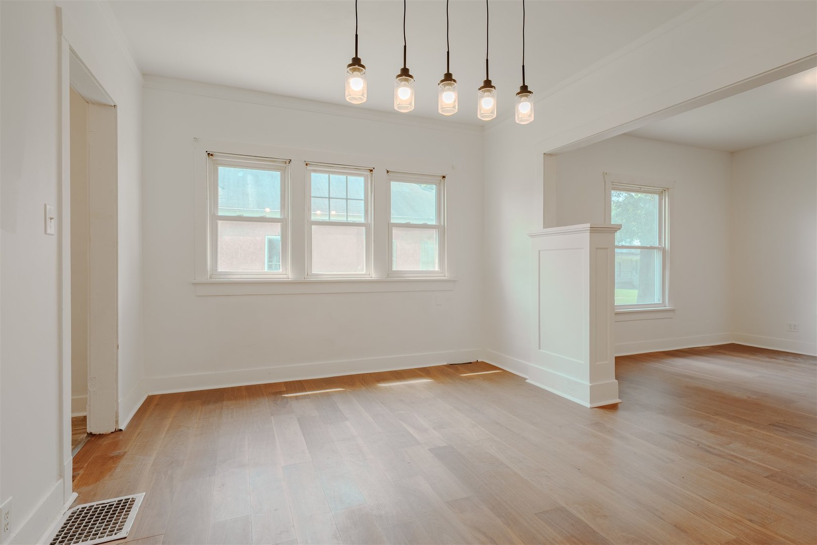 804 North Walnut Street Pontiac, IL 61764 - Photo 8 of 38 wooden floor in an empty room with a window