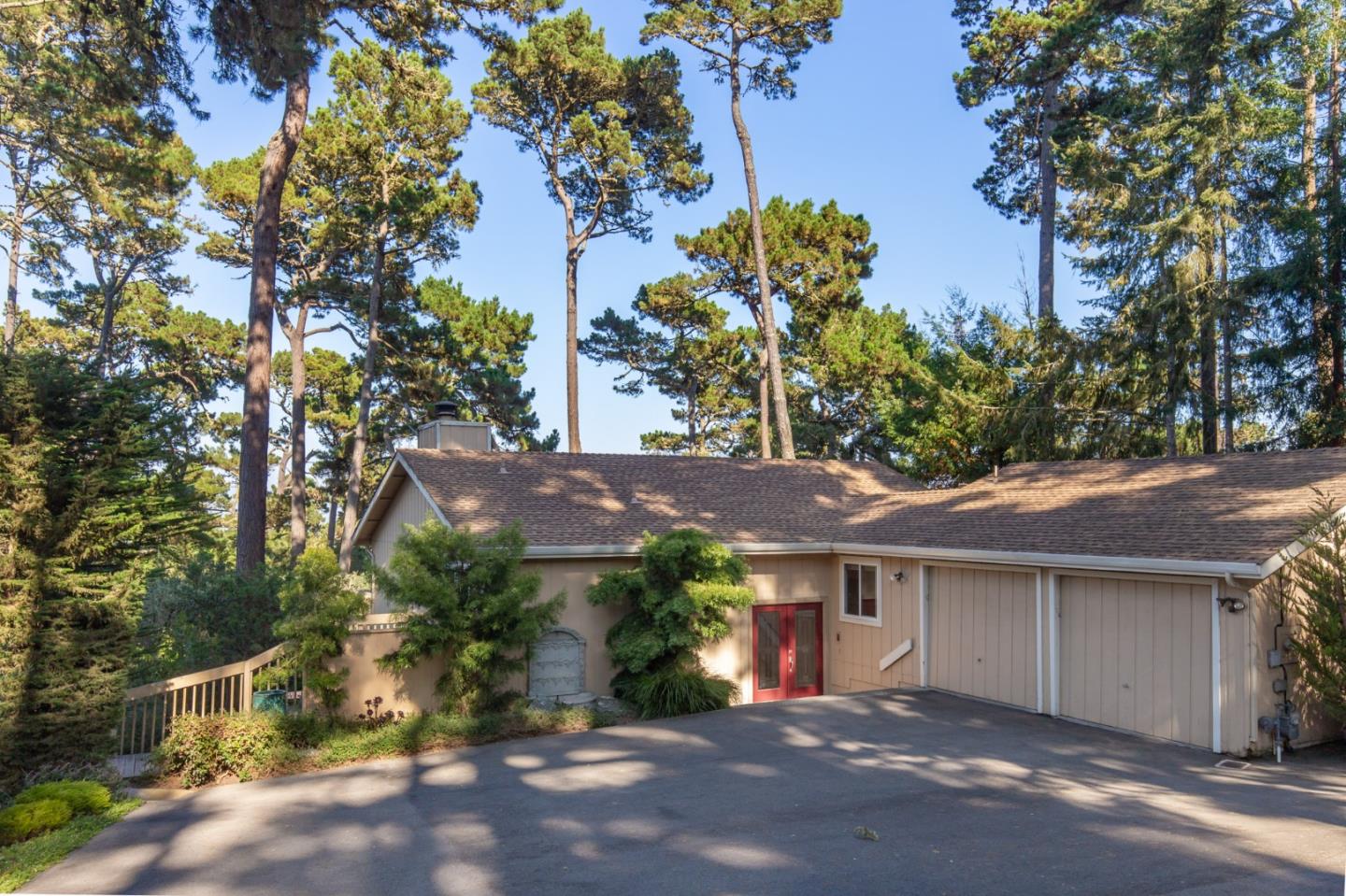 4095 Crest Road Pebble Beach, CA 93953 - Photo 2 of 21 a view of a house with a tree