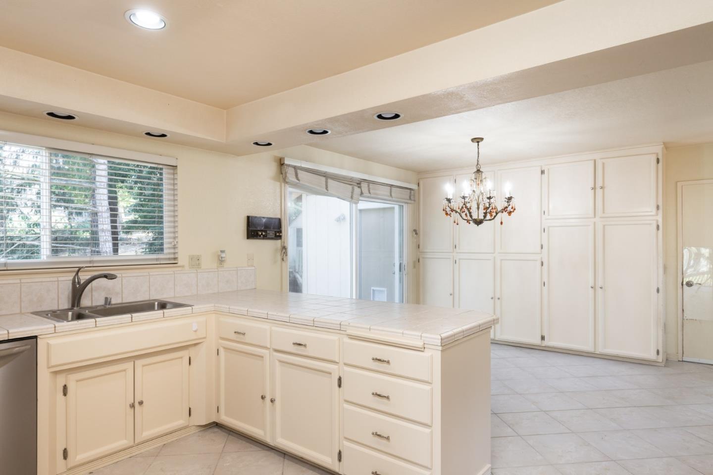 4095 Crest Road Pebble Beach, CA 93953 - Photo 5 of 21 a spacious bathroom with double sink and a window