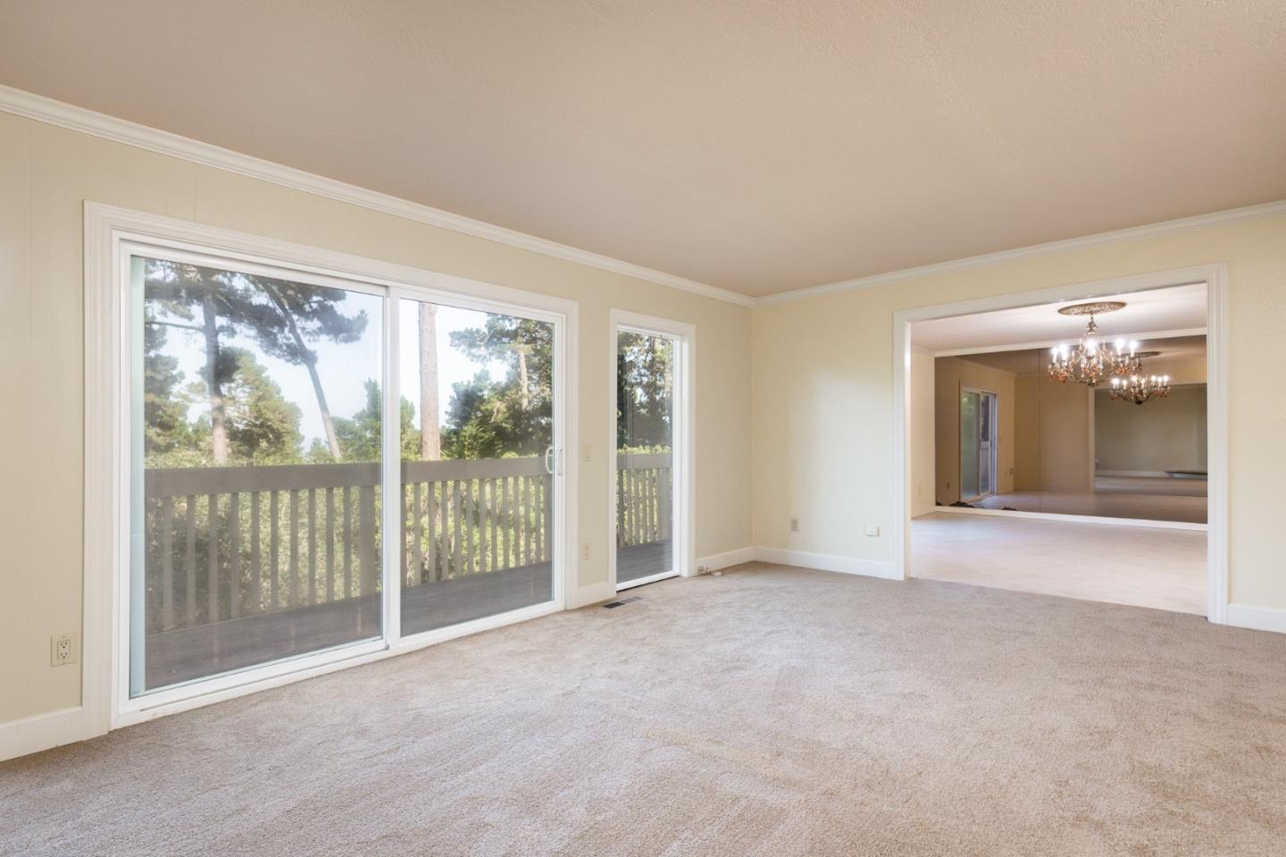 4095 Crest Road Pebble Beach, CA 93953 - Photo 8 of 21 a view of an empty room with glass door