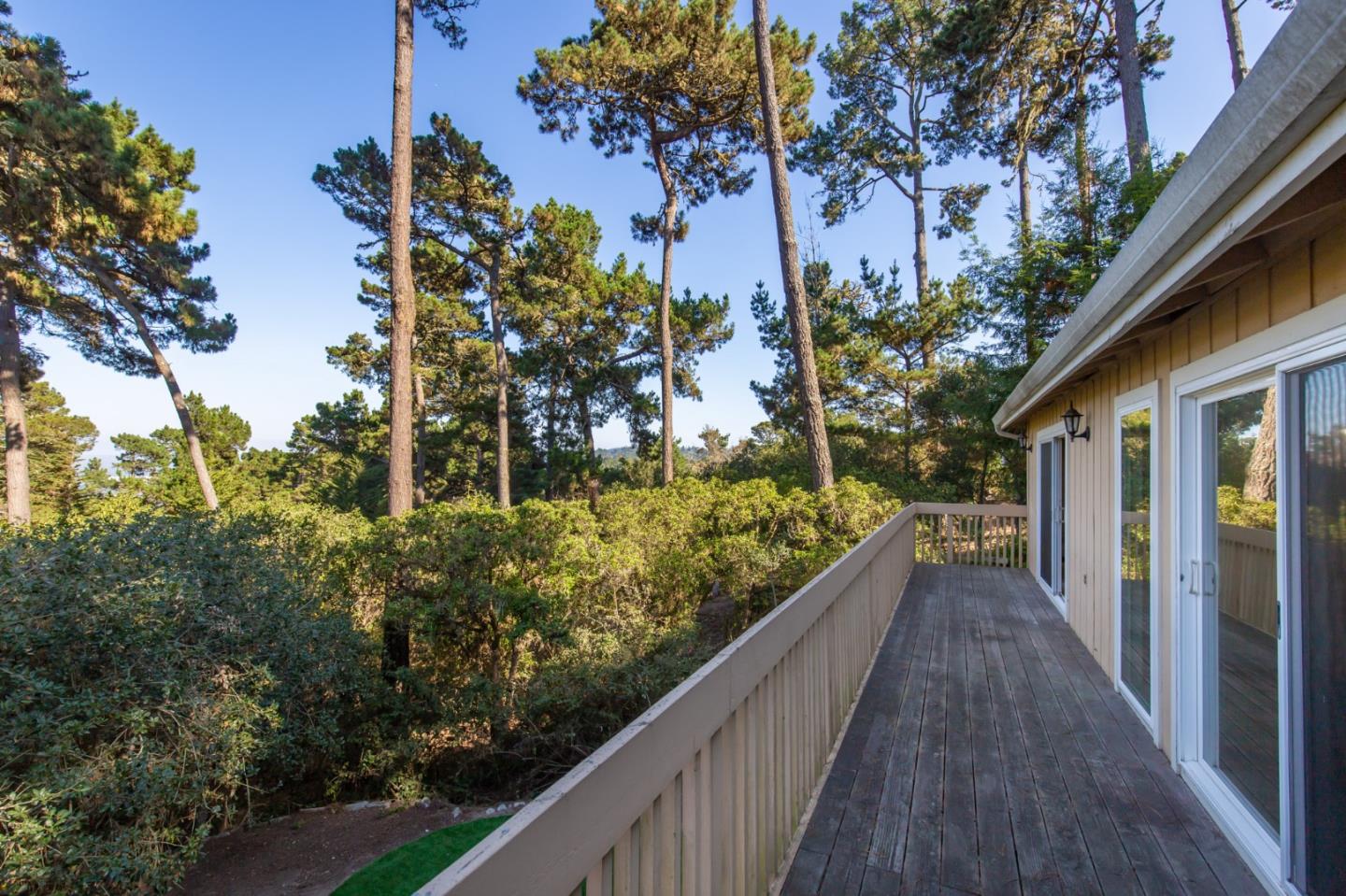 4095 Crest Road Pebble Beach, CA 93953 - Photo 10 of 21 a view of a house with a trees from a balcony