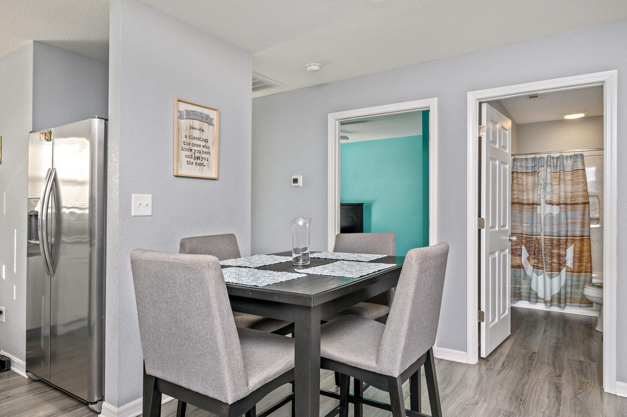 149 Delaware Road DeFuniak Springs, FL 32433 - Photo 13 of 36 a view of a dining room with furniture window and wooden floor