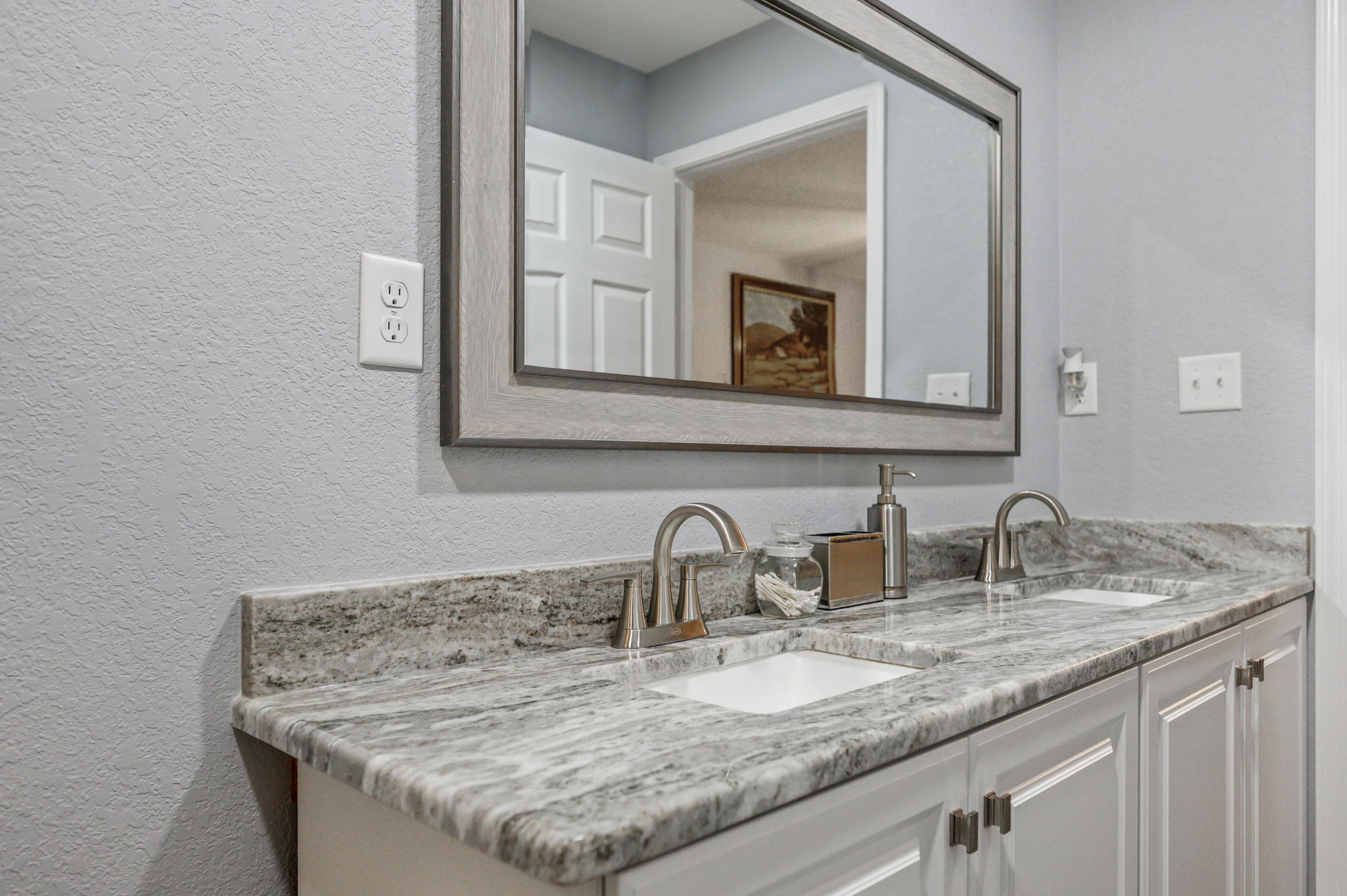 149 Delaware Road DeFuniak Springs, FL 32433 - Photo 19 of 36 a close view of sink and mirror