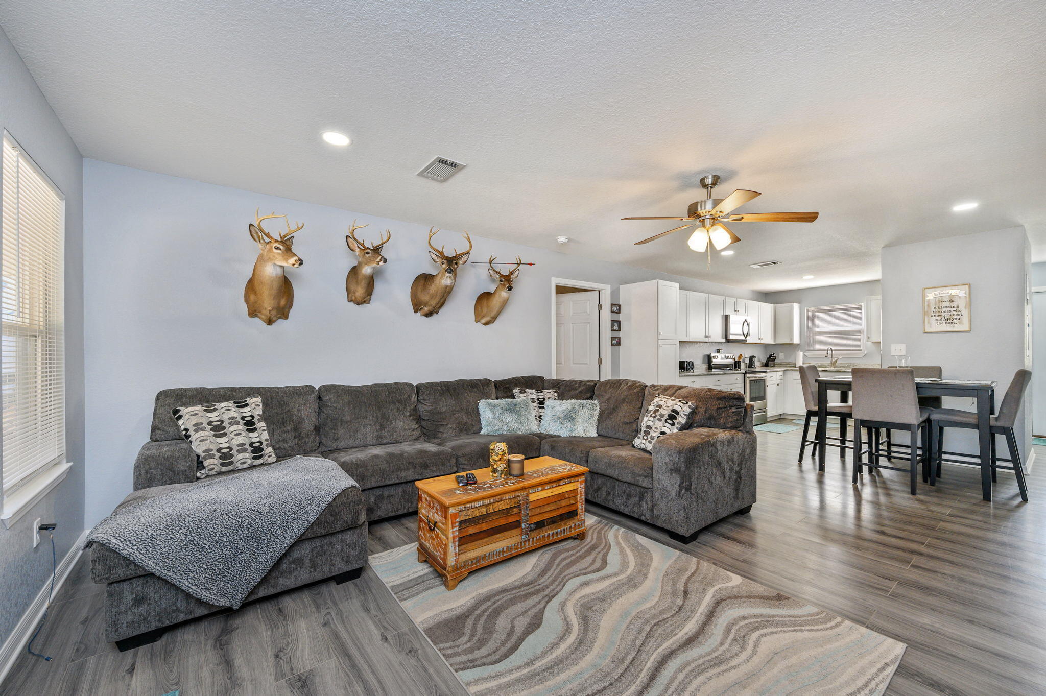 149 Delaware Road DeFuniak Springs, FL 32433 - Photo 7 of 36 a living room with furniture and wooden floor