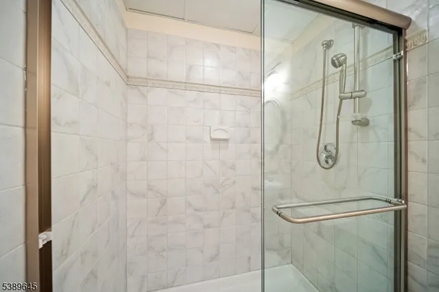 a view of a room with wooden walls