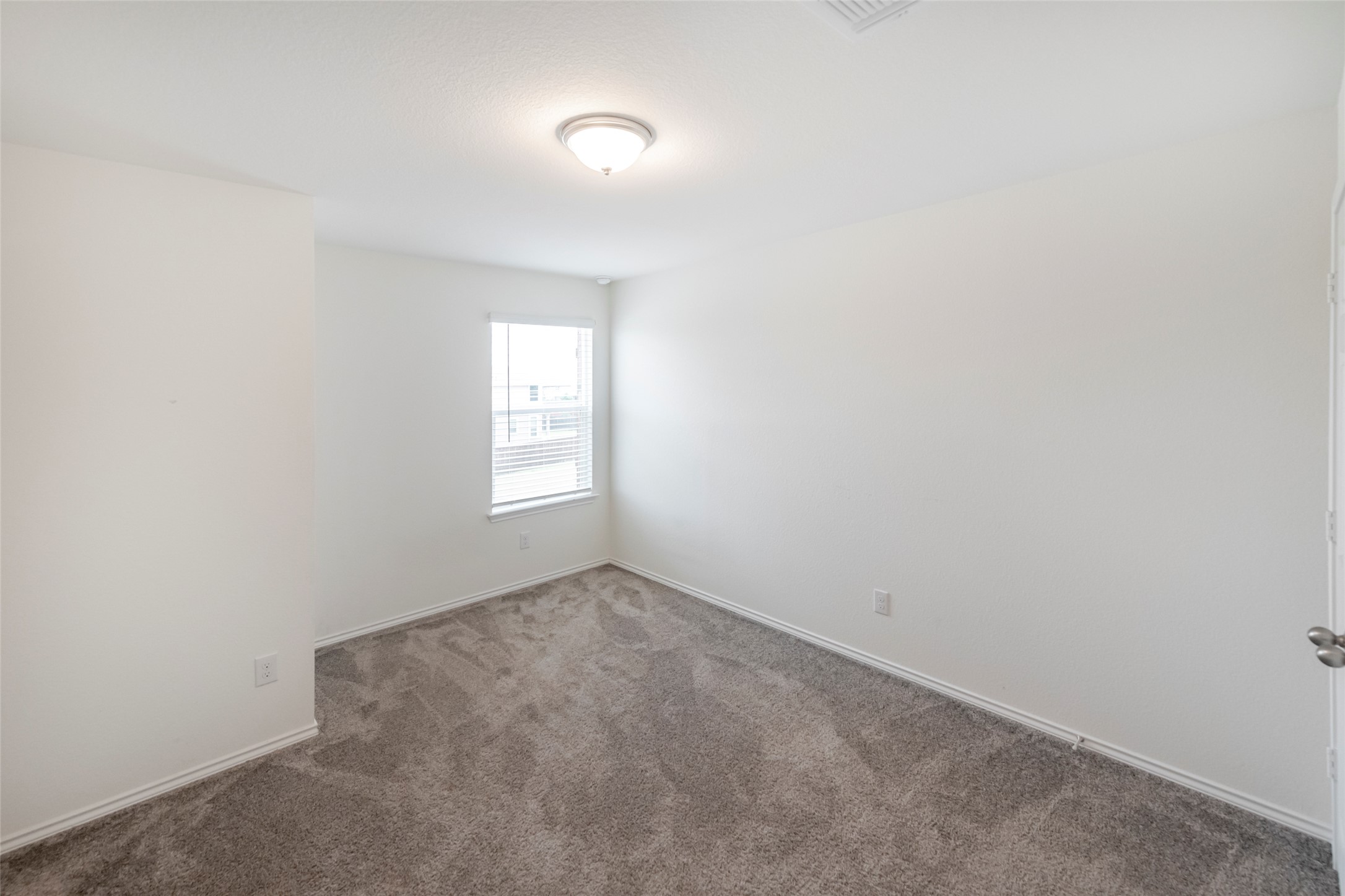 1101 Arbor Acres Loop Leander, TX 78641 - Photo 13 of 19 an empty room with windows