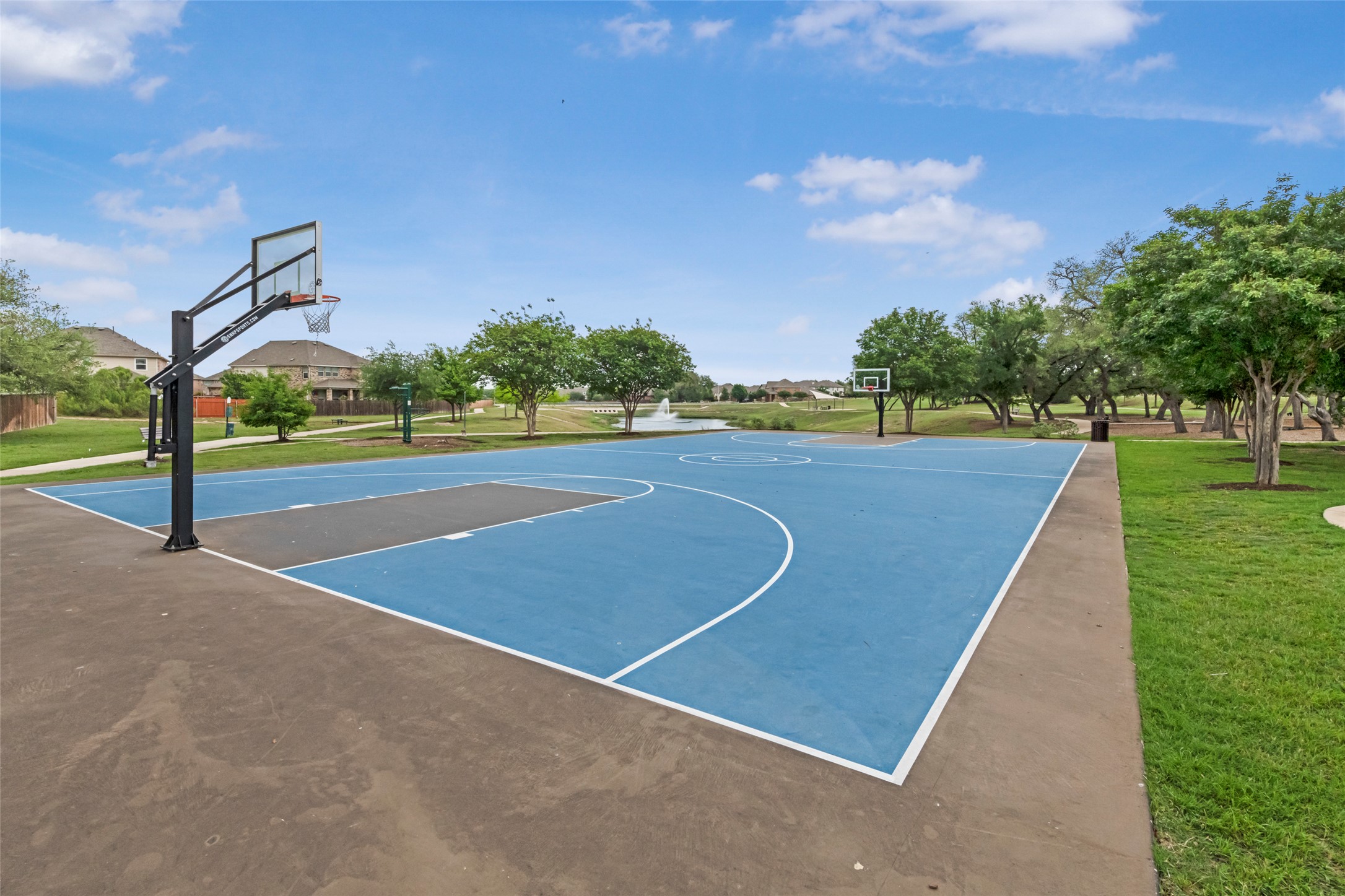 1101 Arbor Acres Loop Leander, TX 78641 - Photo 18 of 19 a view of a tennis court