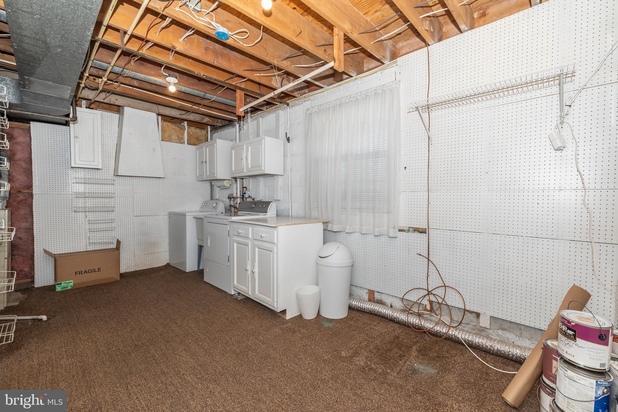 18901 Willow Grove Road Olney, MD 20832 - Photo 43 of 46 The laundry room is huge and so functional