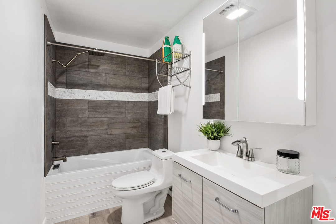 8303 Raintree Circle Culver City, CA 90230 - Photo 13 of 26 a bathroom with a sink toilet and shower