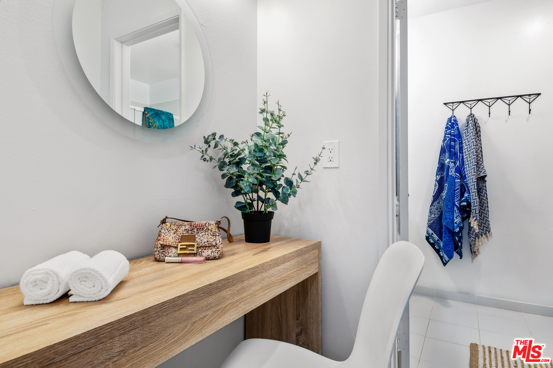 8303 Raintree Circle Culver City, CA 90230 - Photo 17 of 26 a view of a dining room with furniture and wooden floor