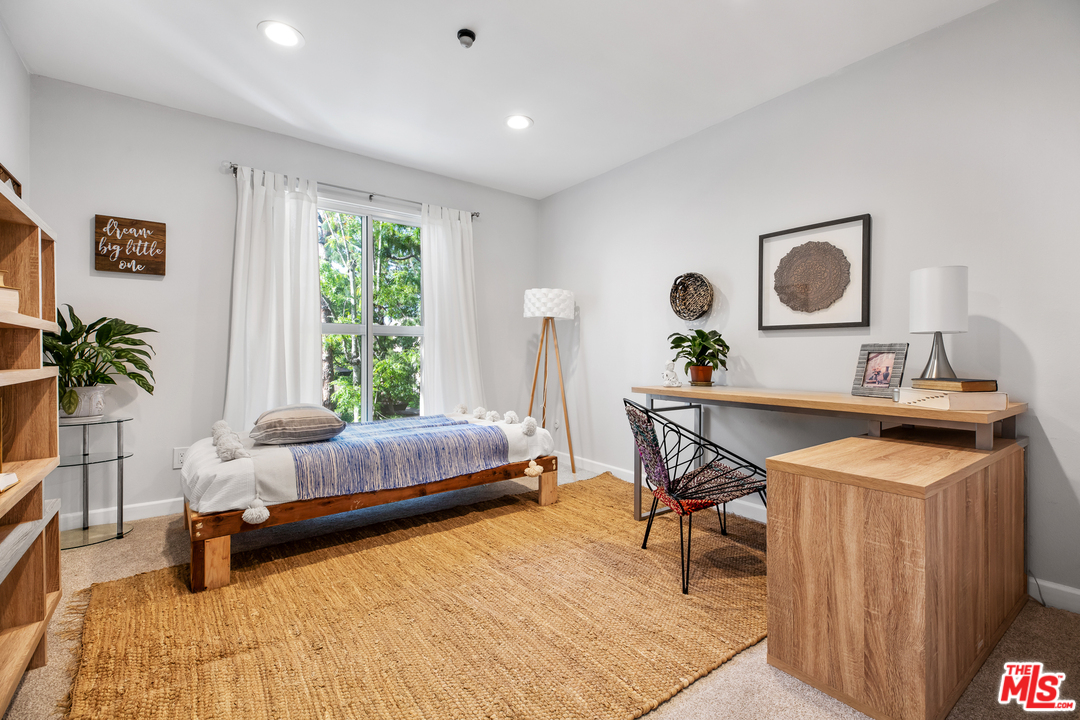 8303 Raintree Circle Culver City, CA 90230 - Photo 20 of 26 a living room with furniture and a window