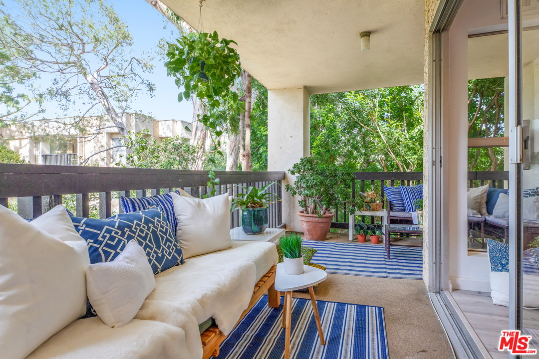 8303 Raintree Circle Culver City, CA 90230 - Photo 3 of 26 a outdoor living room with furniture
