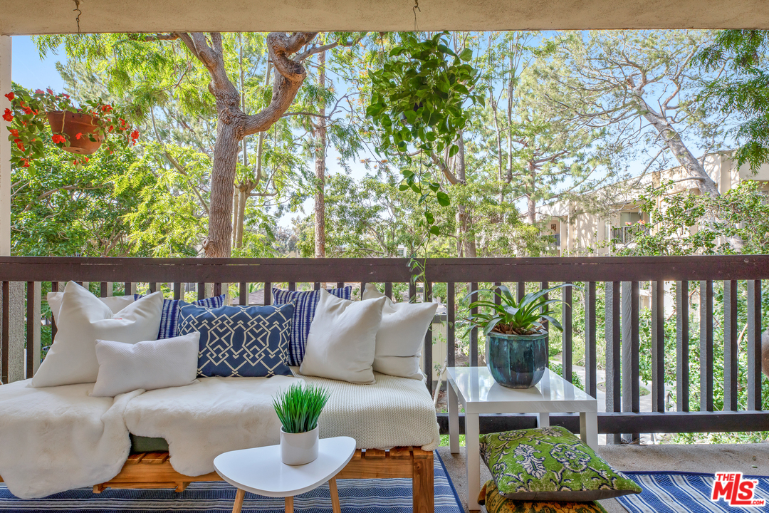 8303 Raintree Circle Culver City, CA 90230 - Photo 4 of 26 a outdoor living room with furniture