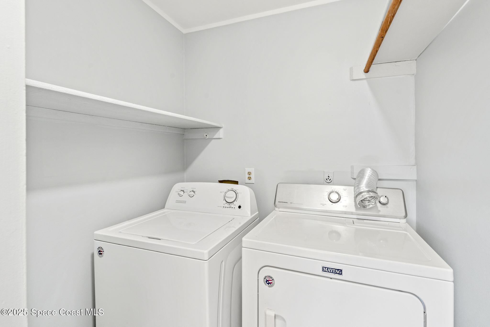 3316 Overlook Drive, Unit 62 Palm Bay, FL 32905 - Photo 16 of 23 a utility room with dryer and washer
