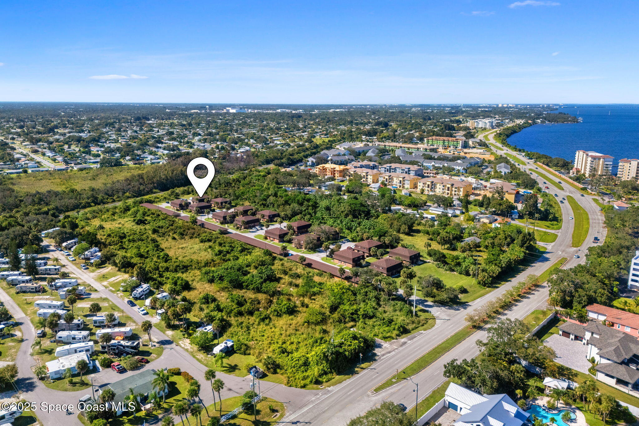 3316 Overlook Drive, Unit 62 Palm Bay, FL 32905 - Photo 19 of 23 an aerial view of a residential houses with city view