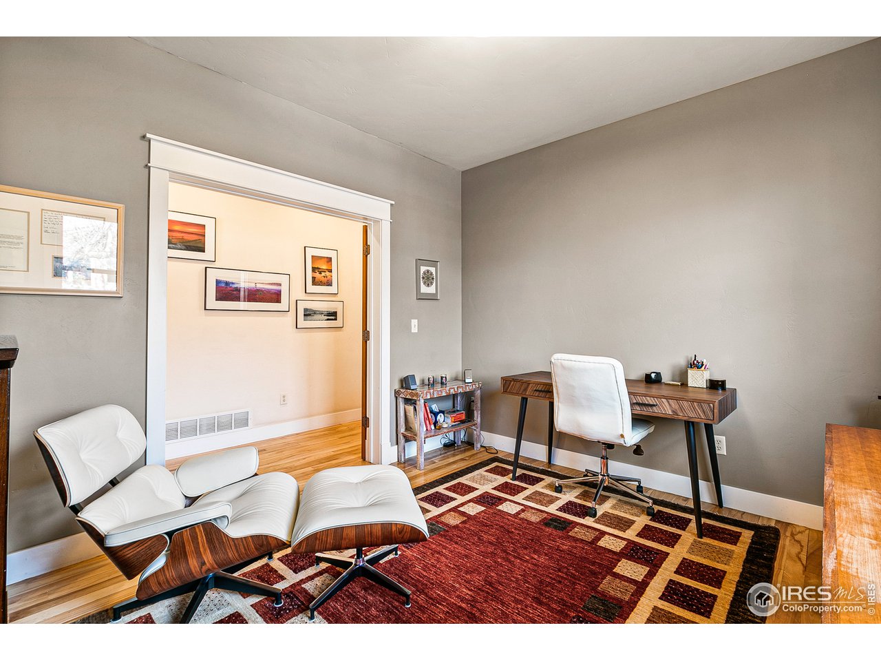 2853 14th Street Boulder, CO 80304 - Photo 18 of 40 a living room with furniture and a rug