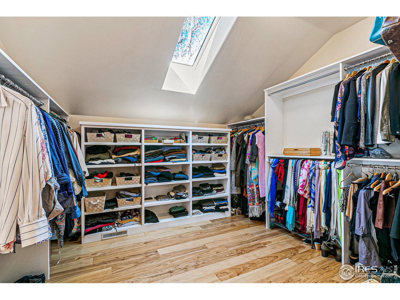 2853 14th Street Boulder, CO 80304 - Photo 30 of 40 a view of walk in closet with clothes and shoes