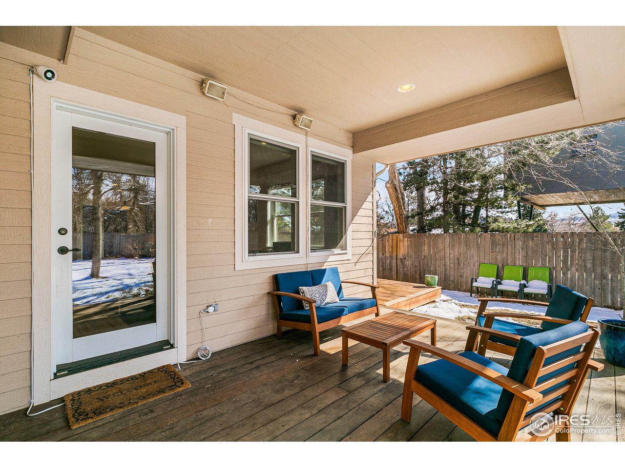 2853 14th Street Boulder, CO 80304 - Photo 37 of 40 a wooden bench sitting in front of a building