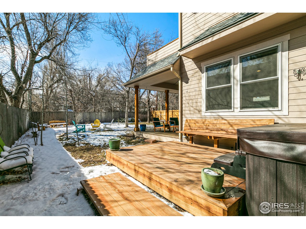 2853 14th Street Boulder, CO 80304 - Photo 38 of 40 a view of a backyard with sitting area and furniture