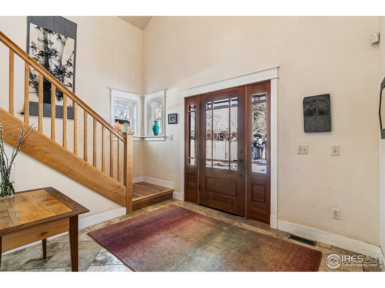 2853 14th Street Boulder, CO 80304 - Photo 4 of 40 a view of an entryway with wooden floor