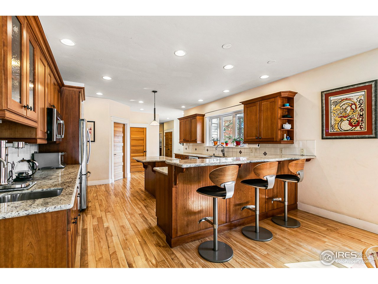 2853 14th Street Boulder, CO 80304 - Photo 10 of 40 a living room with stainless steel appliances kitchen island granite countertop furniture and a view of kitchen
