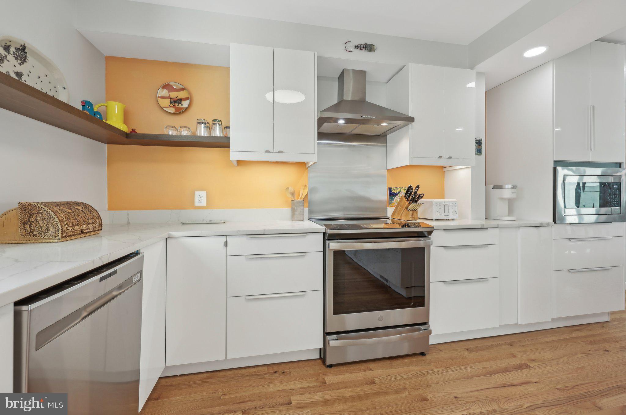 1503 Inlet Court Reston, VA 20190 - Photo 16 of 59 a kitchen with a stove oven and sink