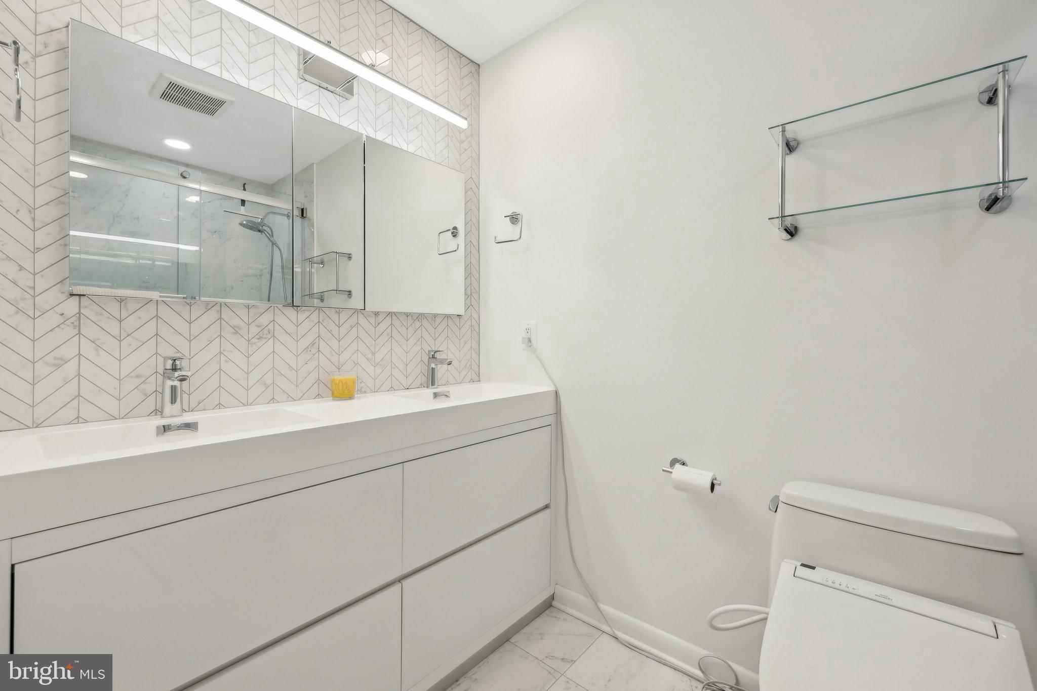 1503 Inlet Court Reston, VA 20190 - Photo 25 of 59 a bathroom with a sink and a bathtub