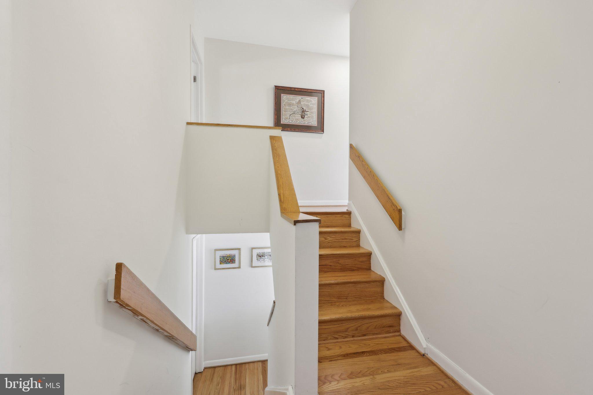 1503 Inlet Court Reston, VA 20190 - Photo 29 of 59 a view of entryway with wooden floor