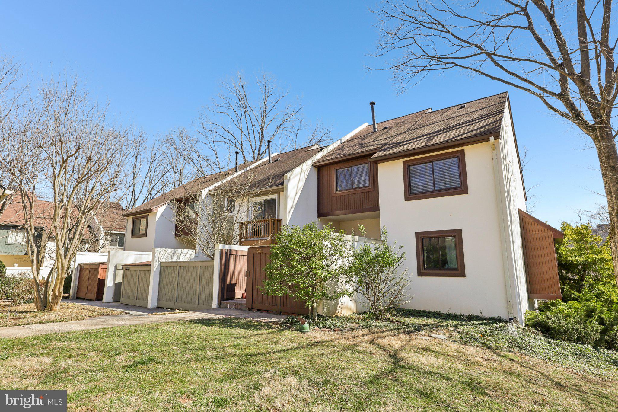 1503 Inlet Court Reston, VA 20190 - Photo 3 of 59 a view of a house with a yard