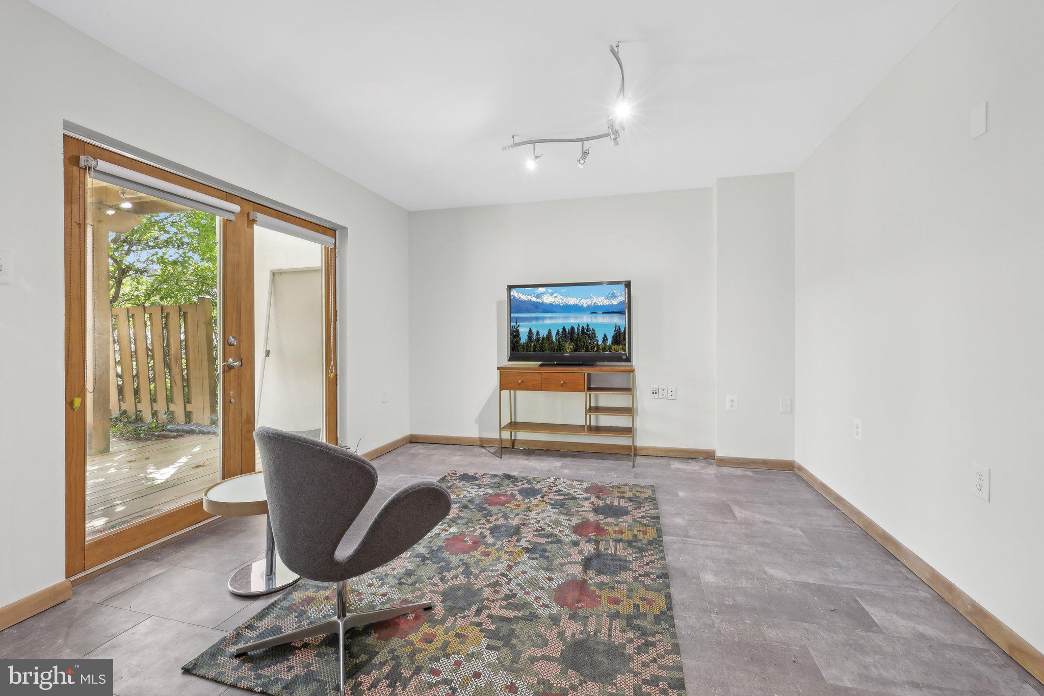 1503 Inlet Court Reston, VA 20190 - Photo 35 of 59 a living room with furniture and a window